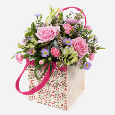 A Little Something
 - Show your affection with this mouth-watering mix of classical flowers delivered in a delightful gift bag or box.
